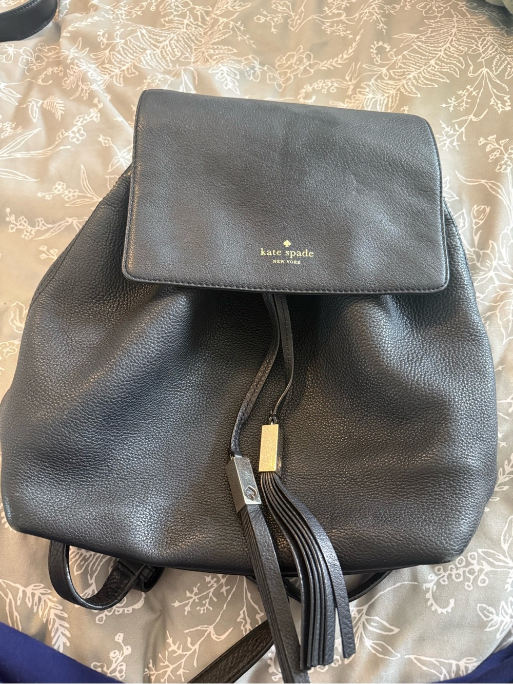 kate spade black leather drawstring backpack with tassel